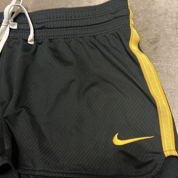 Nike dry fit shorts in black and gold. Live strong logo. - Picture 2 of 10